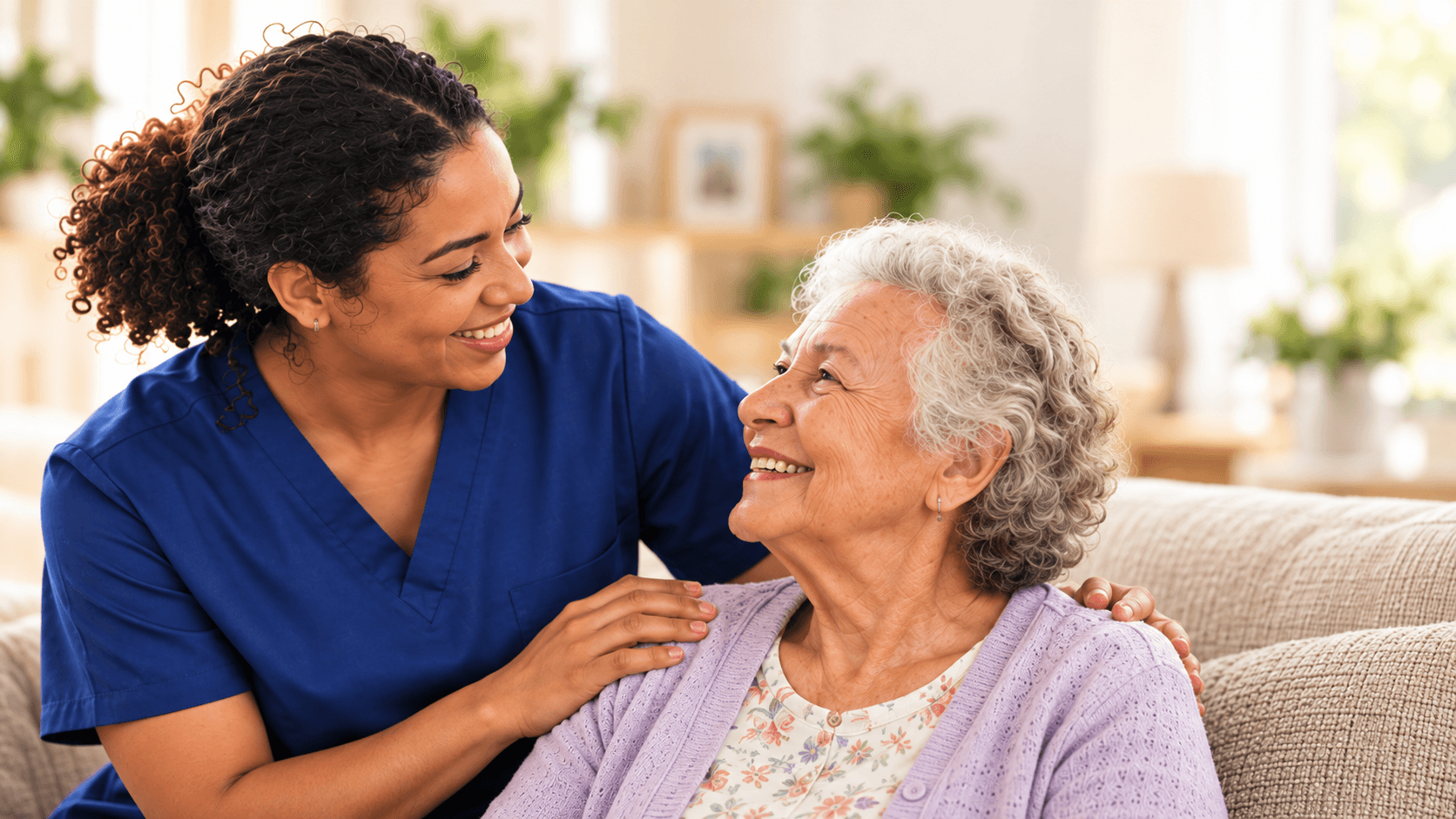A caregiver sharing a warm moment with an older adult at home